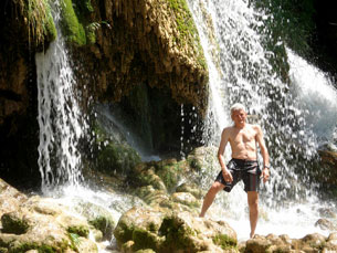 Dad Klocke posing in front of waterfall at Krka National Park