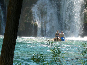 Jay and Kelly swimming by waterfalls in Krka National Park