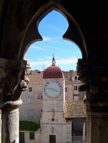 Climbing up the Trogir cathedral tower - looking out the window.