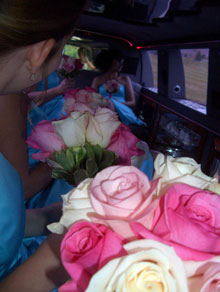All the girls with their flowers in the limo
