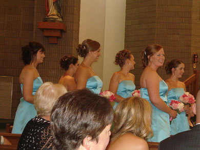 The bridesmaids waiting for Jenny to walk down the aisle