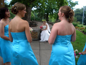 Bridesmaids sharing a laugh while Jenny is looking beautiful