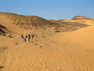 Riding our on camels in Aswan to St. Simon's Monastery