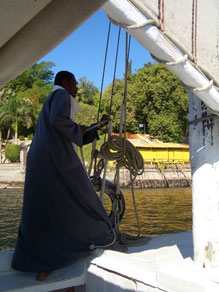 Our felucca captain, navigating on the Nile