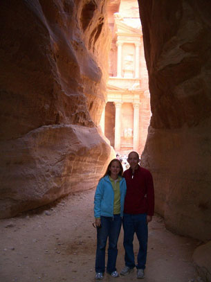 Kelly and Jay stopping for a photo at the end of the Siq, with Al Khazneh in the background