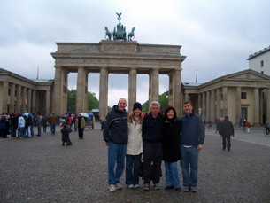 Family photo in the rain at the Brandenburg Gate