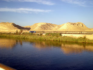 A train traveling alongside the Nile, as seen from our cruise ship