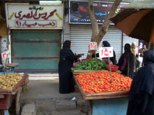 Driving past a market in downtown Cairo
