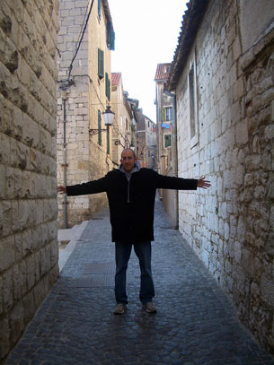 Jay showing how wide our new apartment's street is